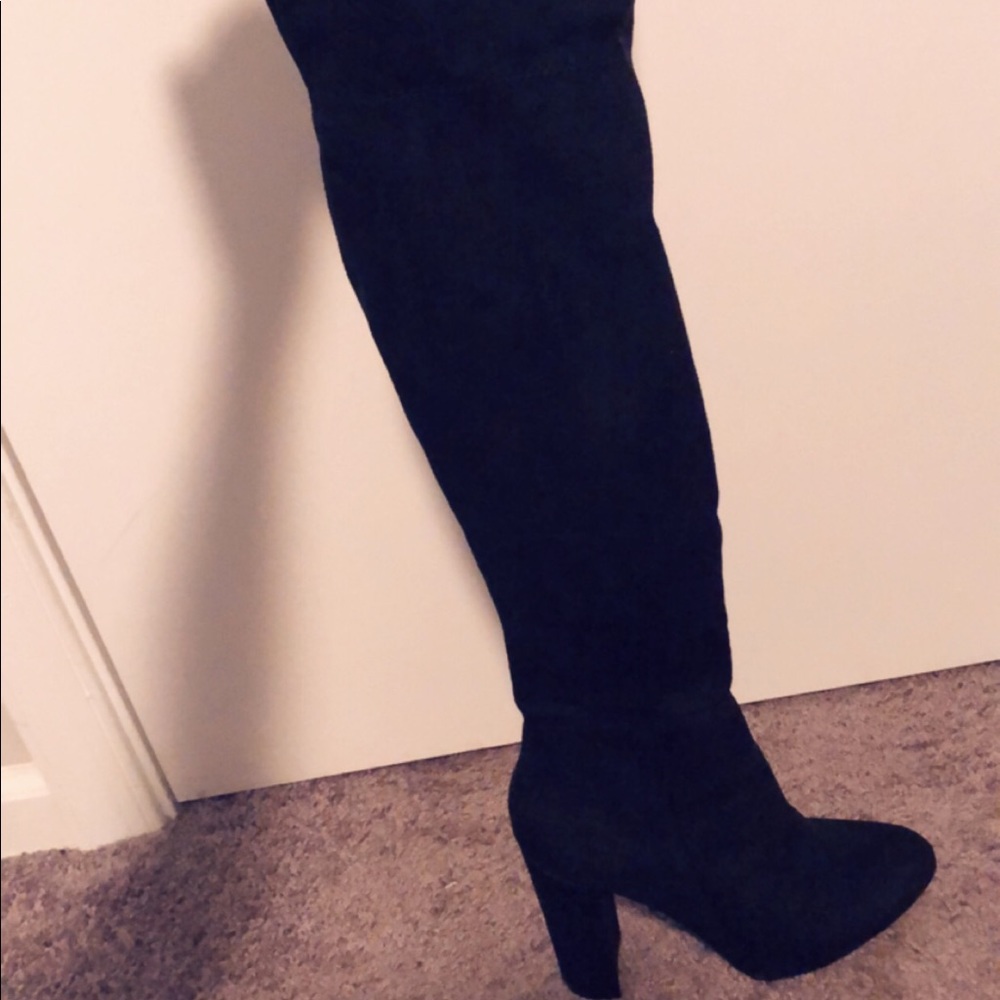 Also woman over the knee boots.